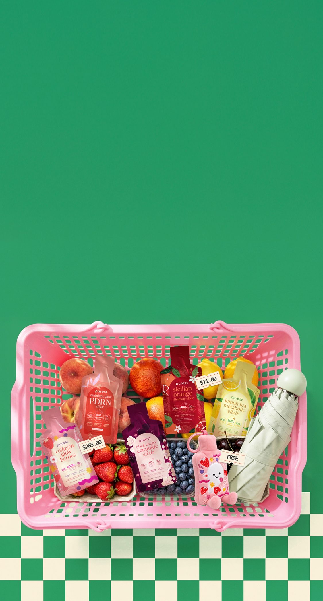A pink Purest Mart shopping basket filled with Midnight Glow PDRN Elixir, Collagen Glow Berries, Black Cherry Ceramide Elixir, Sicilian Orange Slimming Elixir and Lemon Tea Metabolic Elixir sachets, fresh fruit, a plushie and an umbrella